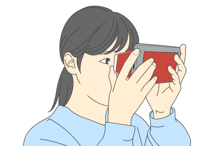 スマートフォンとVriderグラスを一緒に持って動画をみる